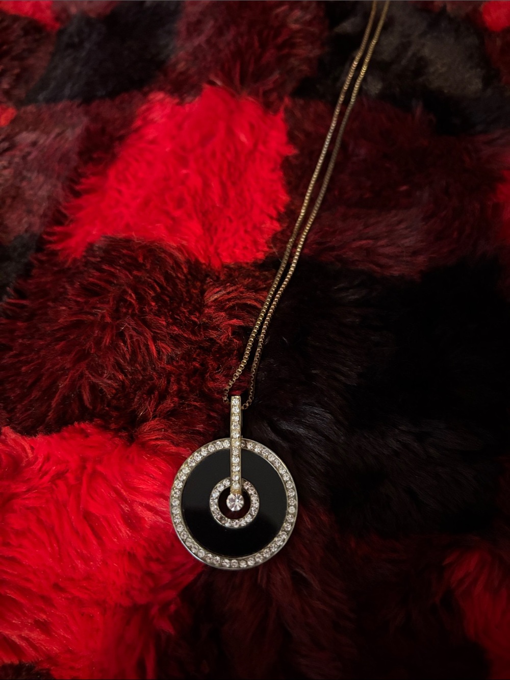 Gold Pendant Necklace with Black Onyx and Clear Stone Accents